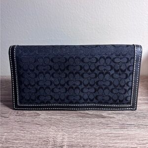 COACH Checkbook Cover, leather interior, with built in pen holder.